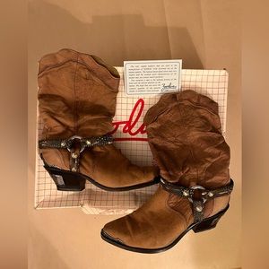 Zodiac USA vintage fashion cowboy boots with metal and feather accents.